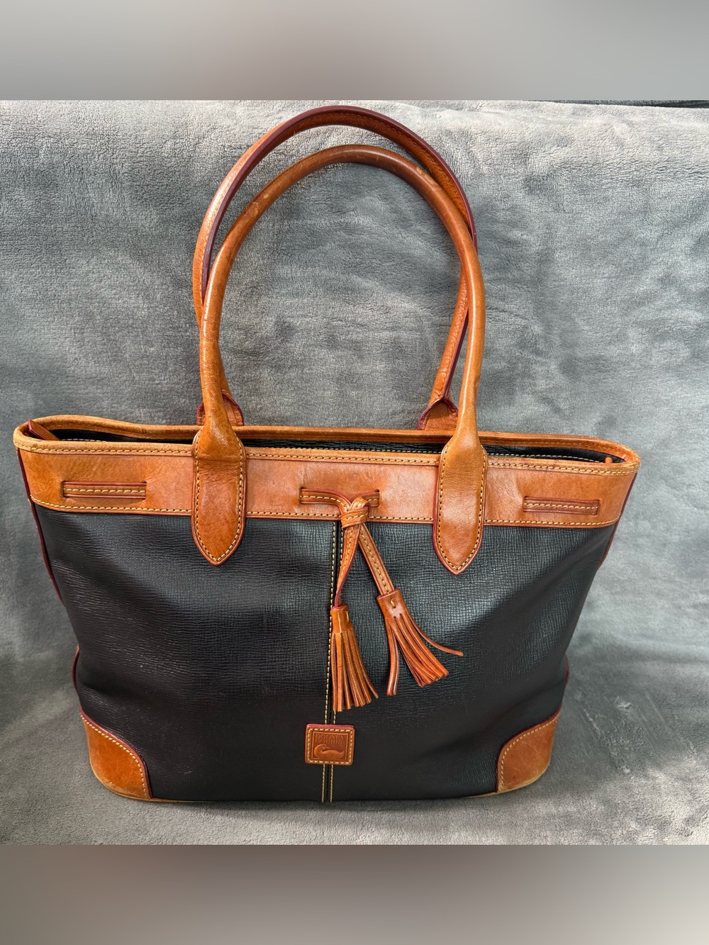Dooney & Bourke Saffiano Tassel Bucket Tote Bag Black Tan Trim Red Interior